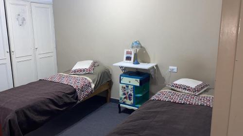 Postel nebo postele na pokoji v ubytování Quinta 4A