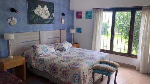 Postel nebo postele na pokoji v ubytování Quinta 4A