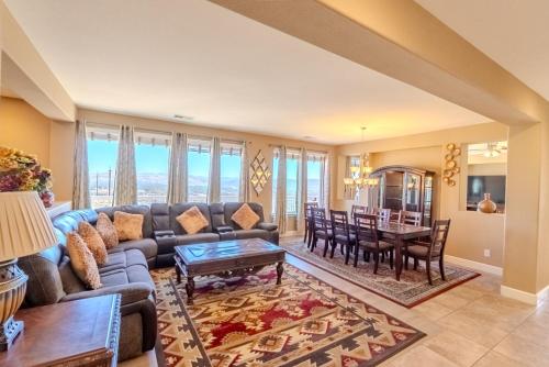 a living room with a couch and a table at Sierra Vista Retreat - Reno Tahoe in Reno