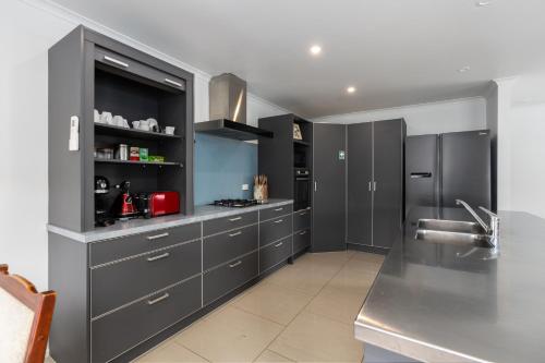 Kuchyň nebo kuchyňský kout v ubytování Barnarch Cottage