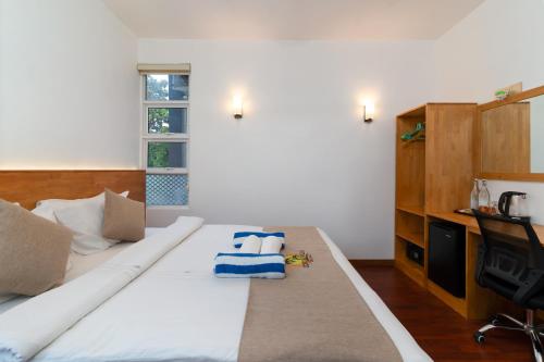 Postel nebo postele na pokoji v ubytování Coco Ukulhas Villa