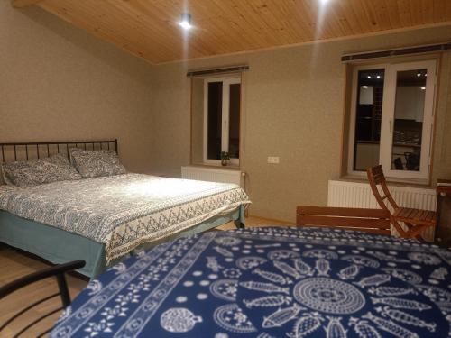 Ένα ή περισσότερα κρεβάτια σε δωμάτιο στο Rostomaant Marani Family Winery Guest House, Telavi