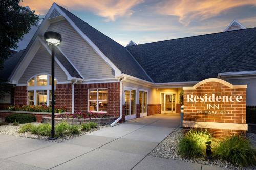 a building with a sign for a residence inn at Residence Inn by Marriott Bloomington by Mall of America in Bloomington