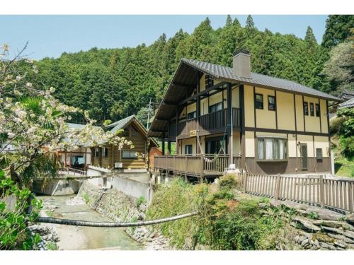 a large house in the middle of a mountain at Keiryusou - Vacation STAY 50707v in Kinokawa