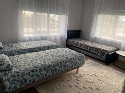 Ένα ή περισσότερα κρεβάτια σε δωμάτιο στο Mustvee aparts