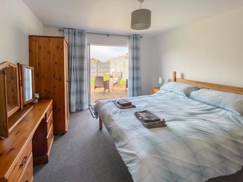 Postel nebo postele na pokoji v ubytování Lilypots