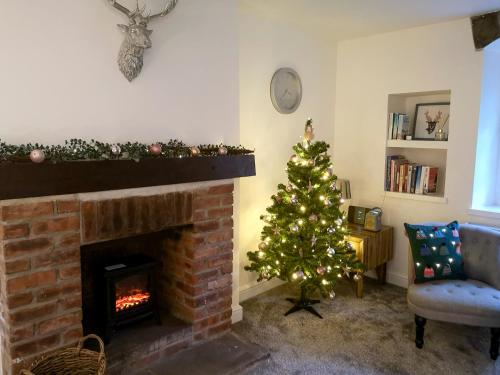 Posezení v ubytování Beckside Cottage