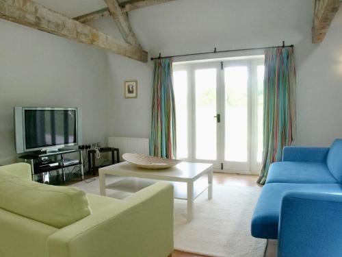 Posezení v ubytování Cow Shed