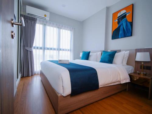 Postel nebo postele na pokoji v ubytování City View Balcony & Chic Condo with Infinity pool F3B5N10