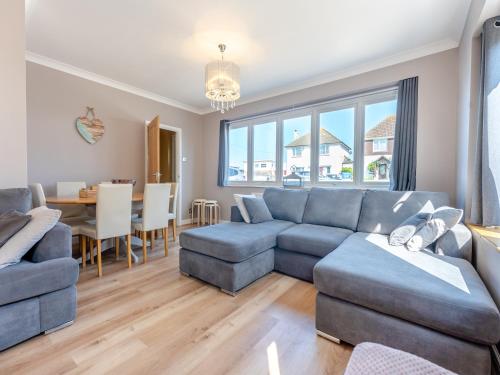 a living room with a couch and a table at Beach Haven - Uk42241 in Littlestone-on-Sea