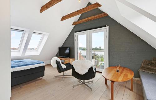 Postel nebo postele na pokoji v ubytování Fiskerhus