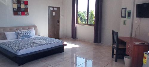 Llit o llits en una habitació de Zosimli Hotel