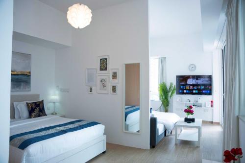 Ένα ή περισσότερα κρεβάτια σε δωμάτιο στο Luxury Jr. 1BR in Mayan Yas Island