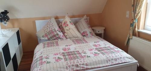 Ένα ή περισσότερα κρεβάτια σε δωμάτιο στο Urlaub an der Müritz