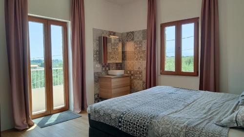 Postel nebo postele na pokoji v ubytování Guesthouse Las Hamacas Abruzzo