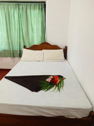 En eller flere senge i et værelse på Andra Home