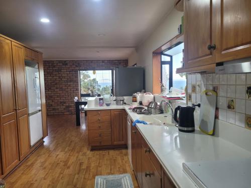 Kuchyň nebo kuchyňský kout v ubytování cliff top house guest rooms