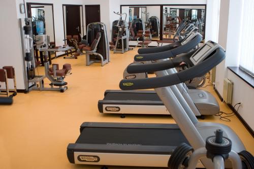 a row of tread machines in a gym at Grand Hotel Pomorie - Medical spa in Pomorie