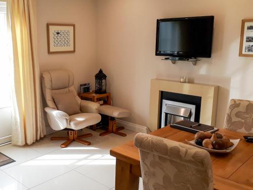 TV a/nebo společenská místnost v ubytování The Left Luggage Office