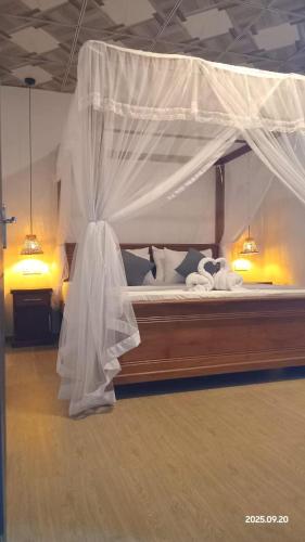 Postel nebo postele na pokoji v ubytování LEAFORA Cottage