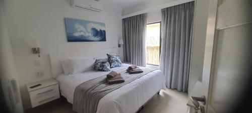 En eller flere senge i et værelse på Propriedade privada Sao Martinho