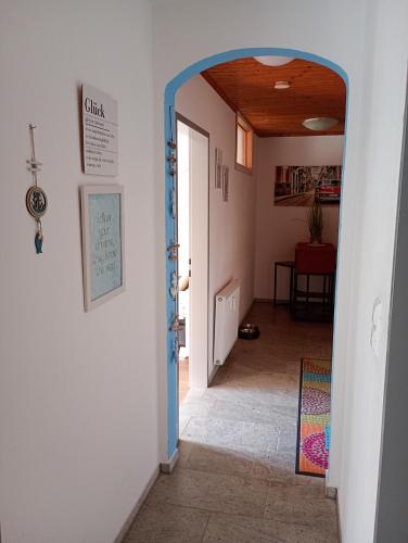 a hallway with an open door to a room at SeeSternchen in Faak am See