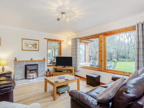 TV a/nebo společenská místnost v ubytování Balnagowan Mill