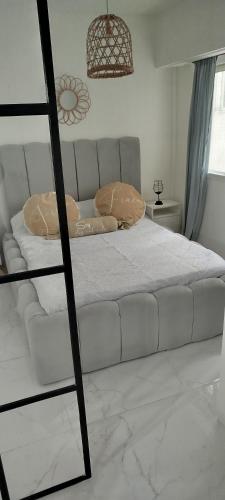 Ένα ή περισσότερα κρεβάτια σε δωμάτιο στο Bolivar Beach - Mar del Plata