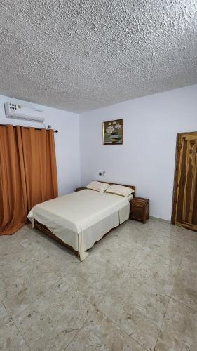 Postel nebo postele na pokoji v ubytování Belmaison