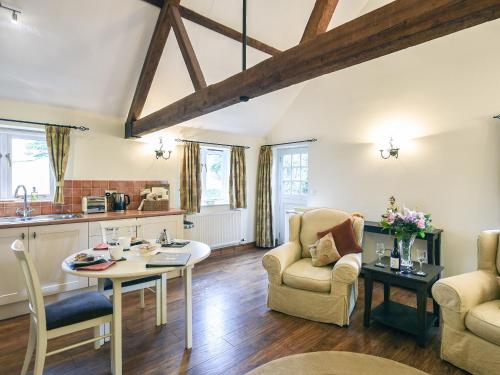 Et opholdsområde på The Corn House - Cottage