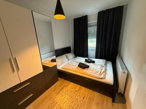 Postel nebo postele na pokoji v ubytování LaSa Apartment