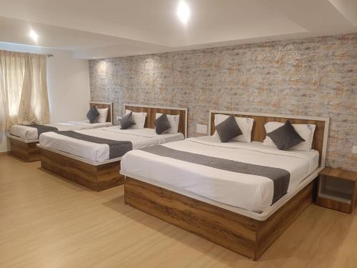 Ένα ή περισσότερα κρεβάτια σε δωμάτιο στο Hillcrest Metro