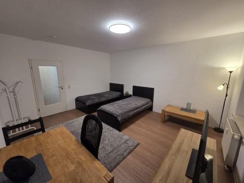 Postel nebo postele na pokoji v ubytování Stylische Flat mit franzsischem Balkon