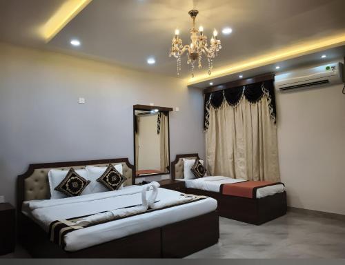 Postel nebo postele na pokoji v ubytování YMCA SEACOM INN