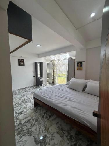 Postel nebo postele na pokoji v ubytování Zarax home stay