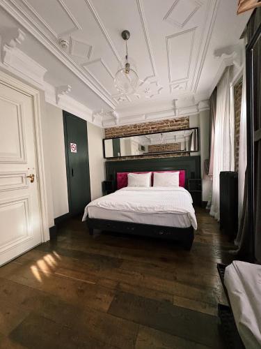 a bedroom with a large bed in a room at Taksim Avenue in Istanbul