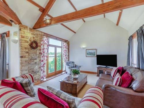 Μια τηλεόραση ή/και κέντρο ψυχαγωγίας στο New Park Farm - Church Cottage