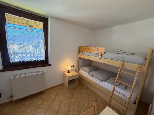 Ένα ή περισσότερα κρεβάτια σε δωμάτιο στο Carola 12