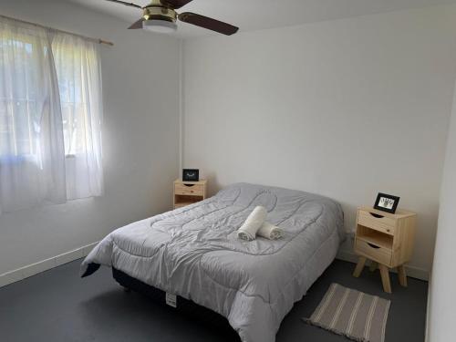 Een bed of bedden in een kamer bij Departamento impecable!