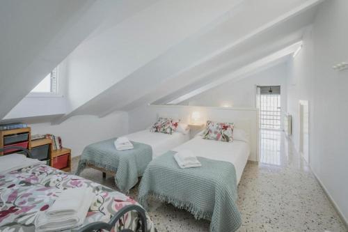 Postel nebo postele na pokoji v ubytování El Romazal