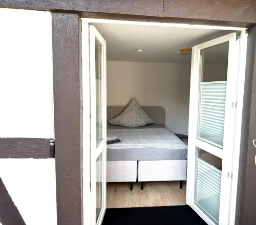 Ein Bett oder Betten in einem Zimmer der Unterkunft Ewelina's Fachwerk-Appartment 2