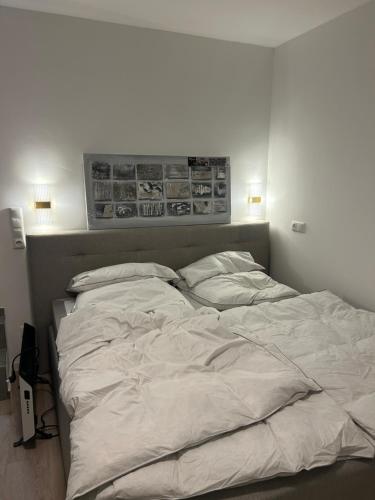 Ένα ή περισσότερα κρεβάτια σε δωμάτιο στο Smart Home Bad Camberg - moderne Ferienwohnung