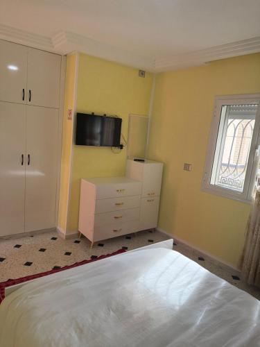 Postel nebo postele na pokoji v ubytování Appart près des ruines romaines.