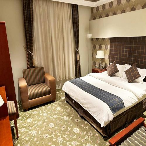 Postel nebo postele na pokoji v ubytování Banan Ruz - شقق مخدومة