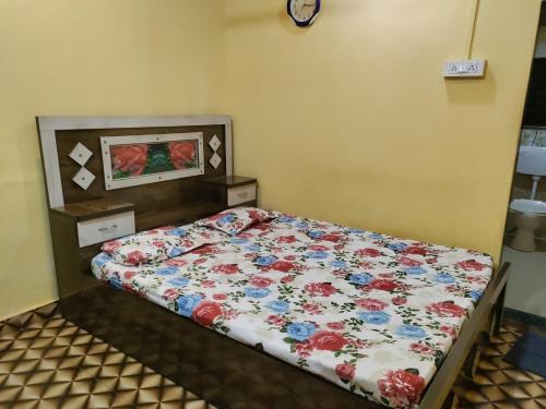 Ένα ή περισσότερα κρεβάτια σε δωμάτιο στο Bageshree homestay