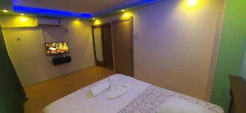 Ένα ή περισσότερα κρεβάτια σε δωμάτιο στο Your home in Izmir