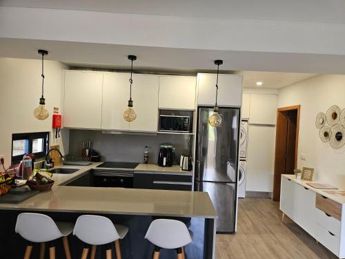 Kuchyň nebo kuchyňský kout v ubytování São Cristóvão AL