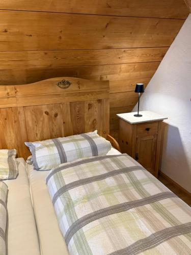 Postel nebo postele na pokoji v ubytování Der Grandlhof