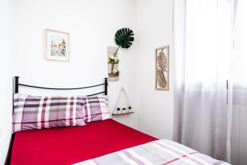 Ένα ή περισσότερα κρεβάτια σε δωμάτιο στο Appartamento Dolce Casa 2