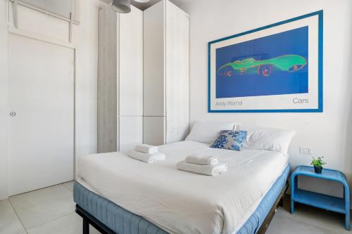 Postel nebo postele na pokoji v ubytování Baroni D - FREE private parking-wi- fi and A-C